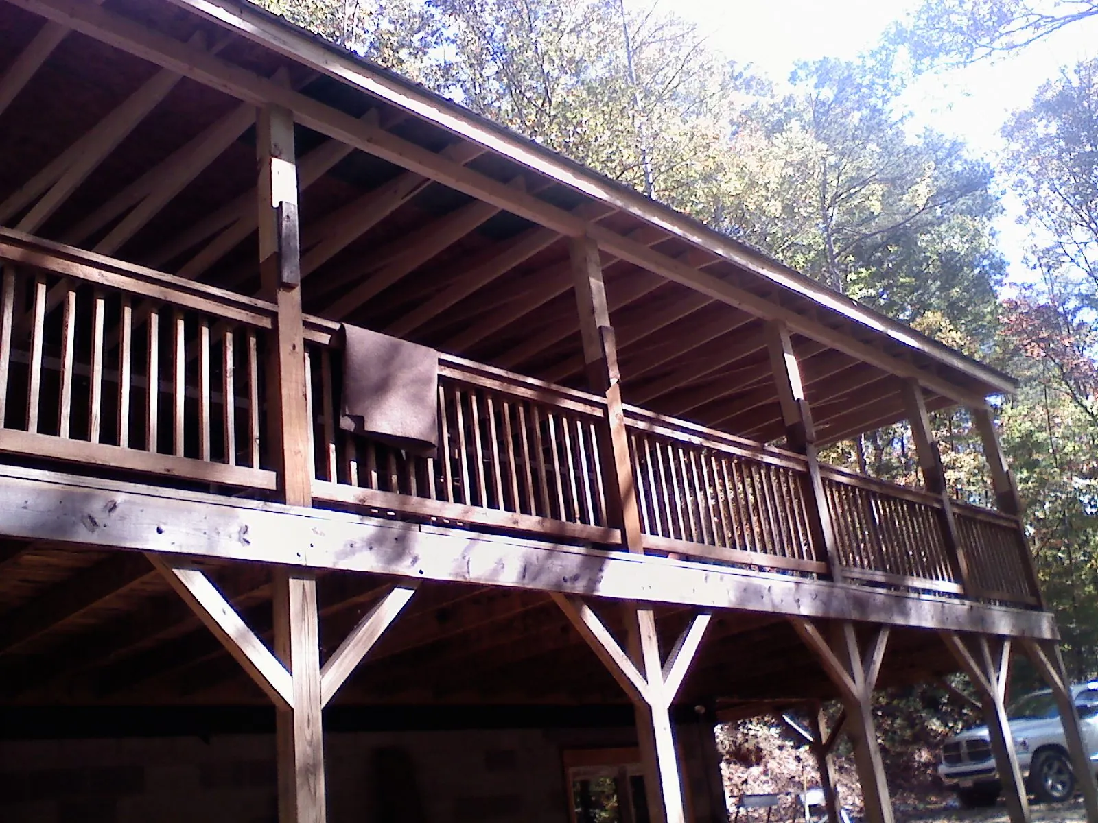 Timber framing under a new elevated porch and deck — Roof Leak Repair in Fremont Center by Roofing Brothers